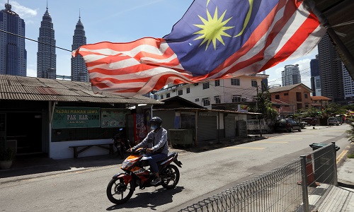 Malaysia`s economy posts biggest annual decline since 1998 crisis