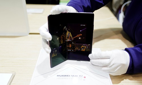 Huawei 2020 revenue ticks up despite U.S. sanctions, chairman says