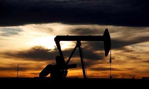 Oil prices climb 2% as dollar slips