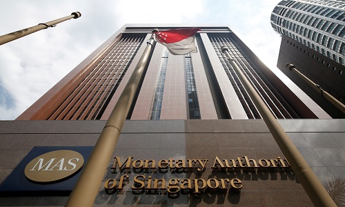 Singapore keeps monetary policy on hold amid patchy recovery