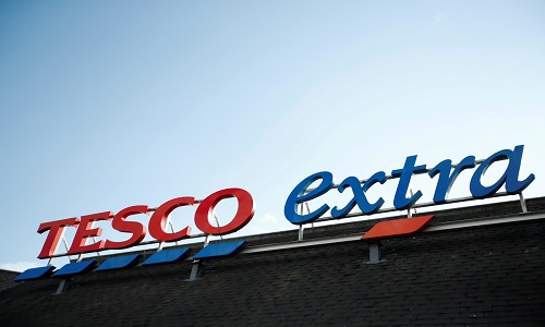 COVID wipes out 20% of Tesco's pretax profit but sales surge