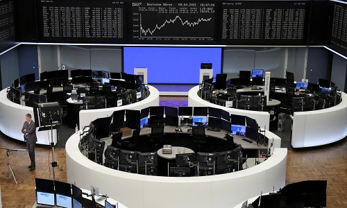 Global stocks sink as investors await earnings, U.S. data
