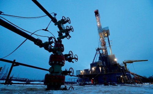Oil falls on surge in U.S. gasoline stocks