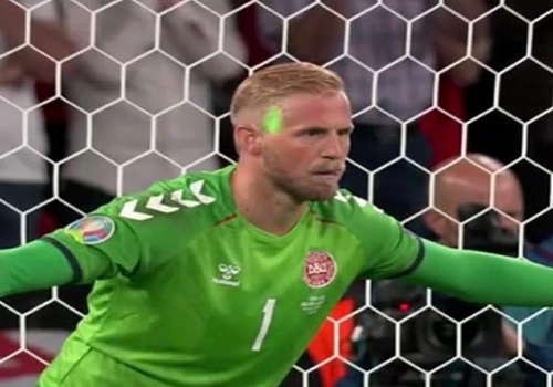 Calls for ban on fan who distracted Danish goalkeeper with laser beam