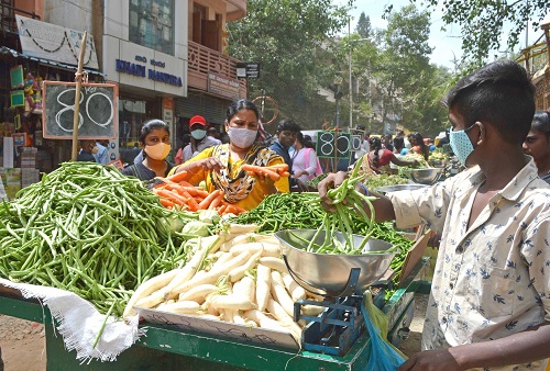 Lower food prices eases India's July retail inflation
