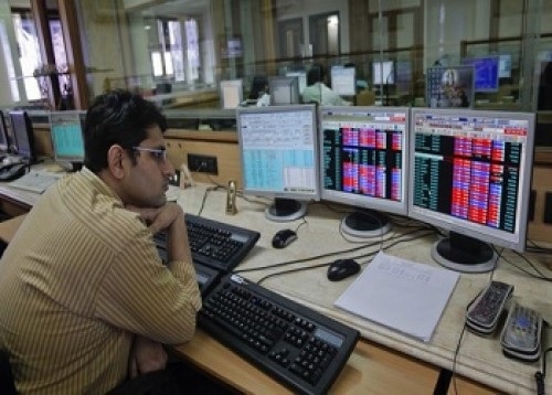 Bourses trade slightly higher in noon session