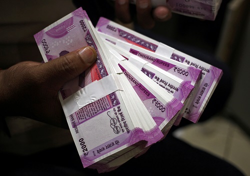 Indian rupee hits 2-1/2-month low, bond yields up as oil spikes