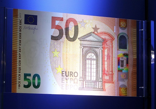 Euro gains on more positive global outlook; Turkish lira holds its gains