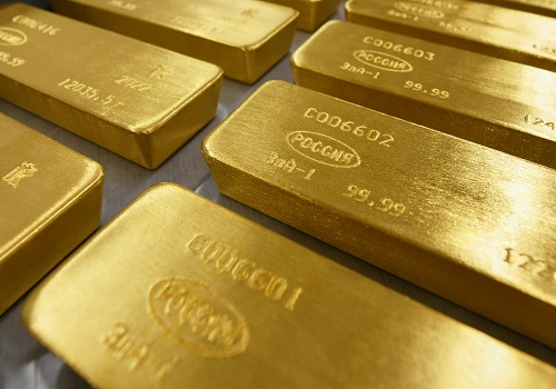 Gold edges lower as firm U.S. dollar weighs