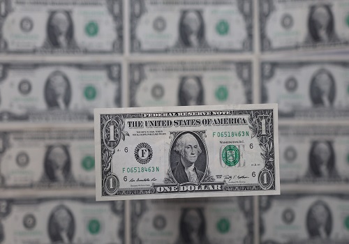Dollar recoils as Fed douses hawkish bets