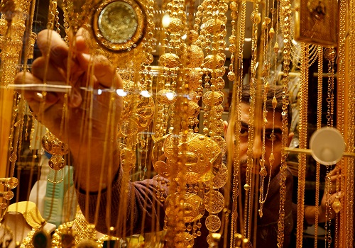 Gold prices set for second weekly gain on dollar pullback