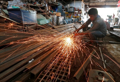 Factory growth feeble in June, feeding global recession fears