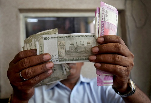 Indian rupee hits record low, breaches 79-mark on dollar strength
