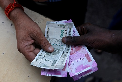 Indian rupee tracks tepid Asian peers, shares to hit record low