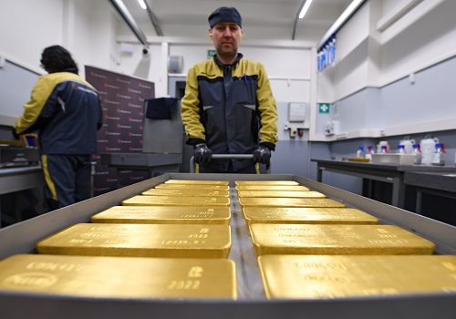 Gold slips, set for second weekly fall as U.S. Treasury yields rise