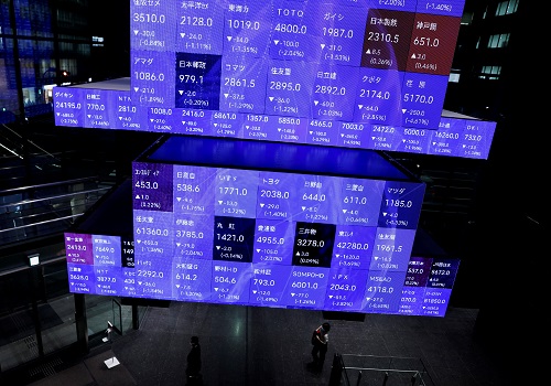 Asian shares higher as dollar retreats, risk events abound