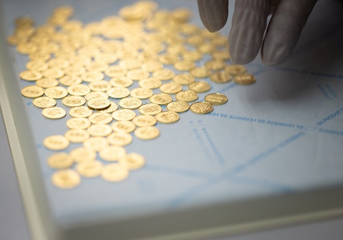 Gold drops as Fed says more rate hikes coming