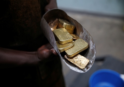 Gold eases on firm dollar as U.S. inflation test looms