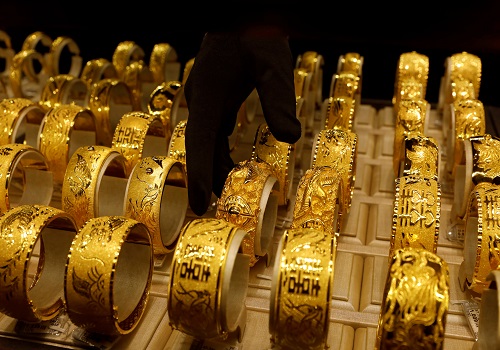 Gold ticks up with focus on US inflation data