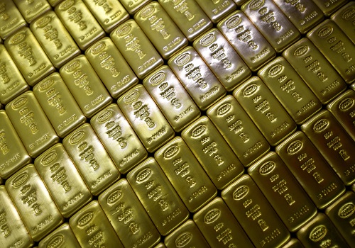 Gold eases on stronger dollar, focus on central bank meetings