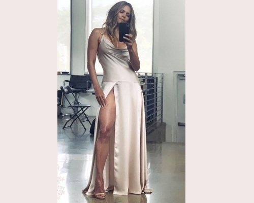 Halle Berry shares mirror selfie in a sexy high slit dress