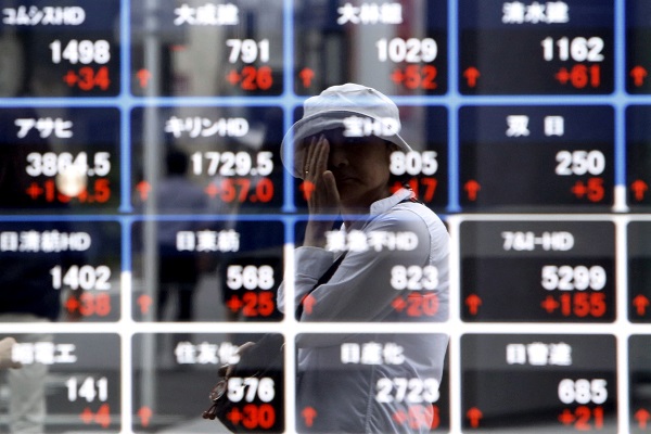 Asian shares climb, oil holds gains as markets eye Iran talks, central bank moves