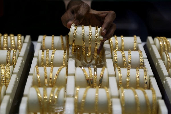 Gold dips as Mideast hostilities revive inflation concerns