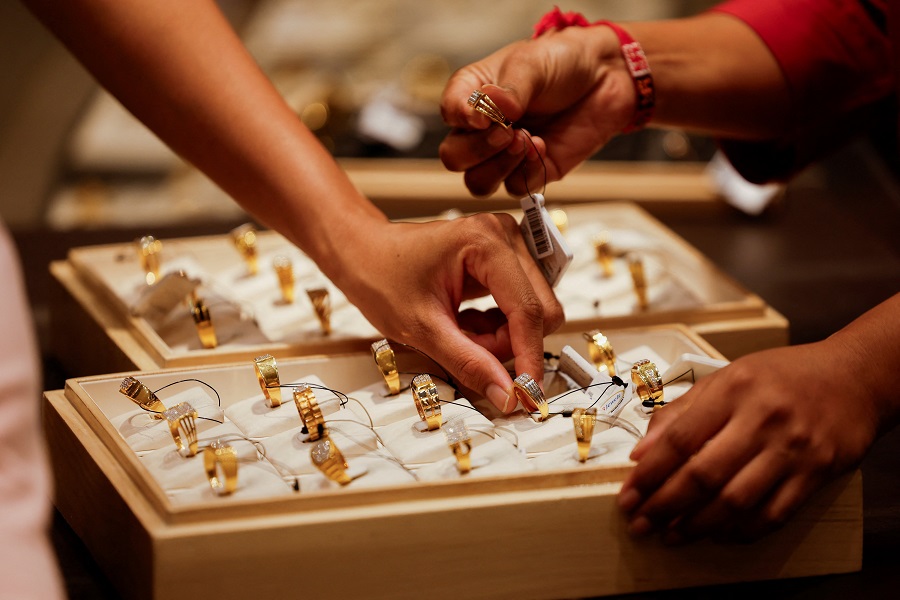 Gold hits record high as US-China trade woes escalate; silver scales all-time peak
