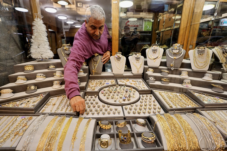 Gold hovers near record high on safe-haven demand; Fed decision in focus