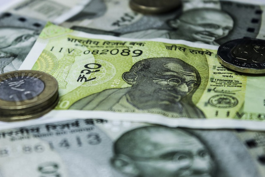 Indian rupee to make modest gains by year-end