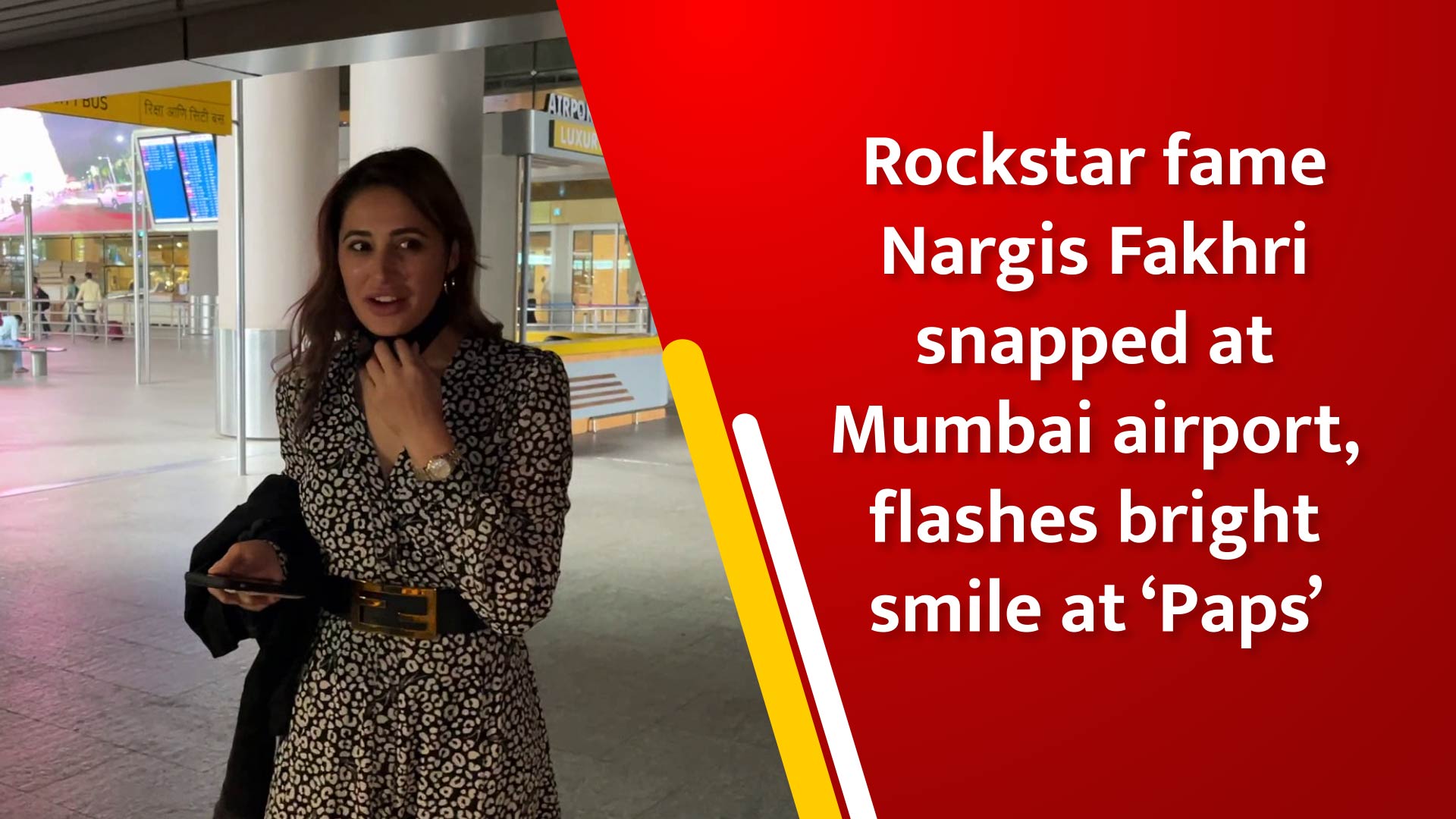 Rockstar fame Nargis Fakhri snapped at Mumbai airport, flashes bright smile at `Paps`