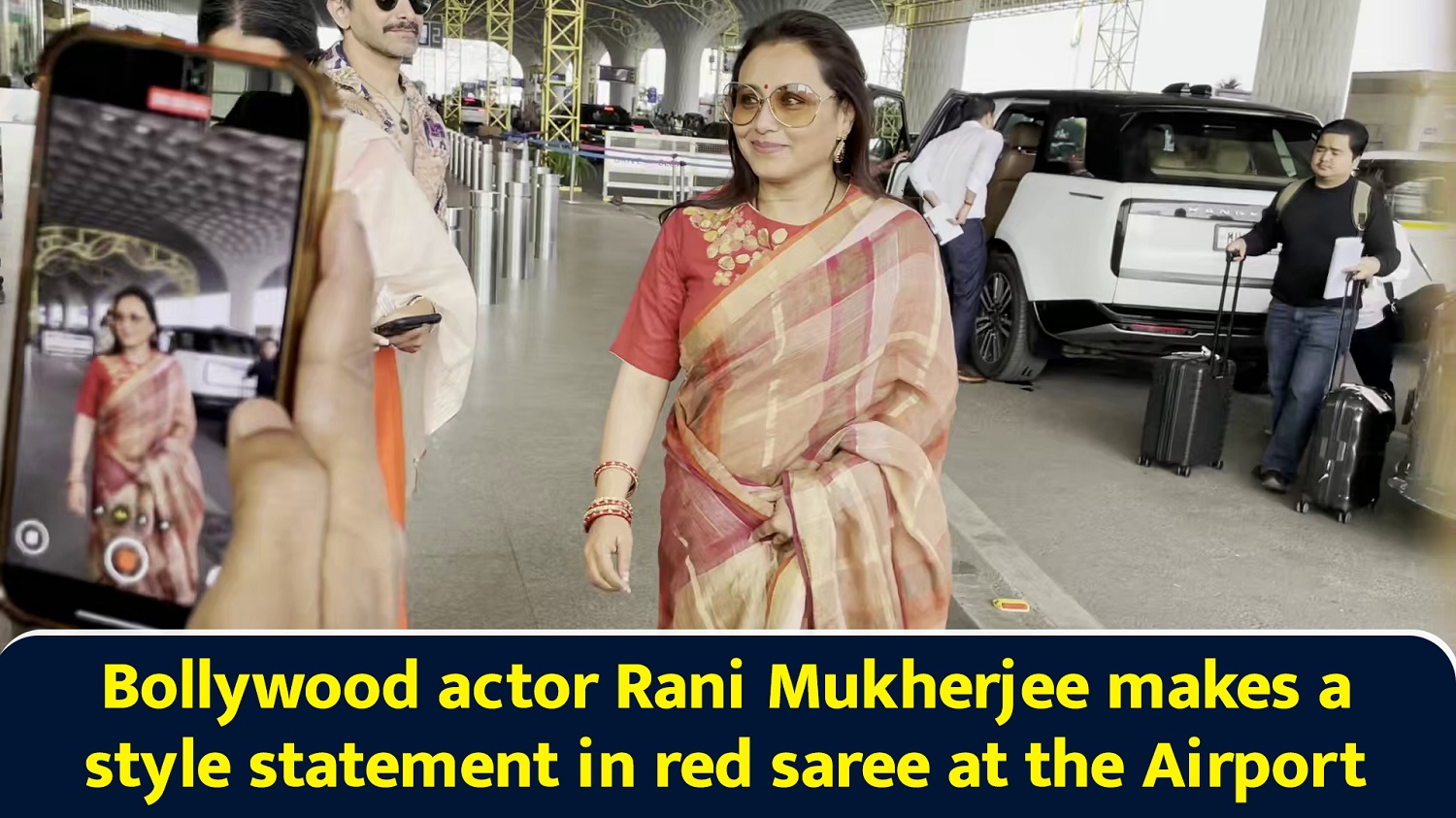 Bollywood actor Rani Mukherjee makes a style statement in red saree at the Airport