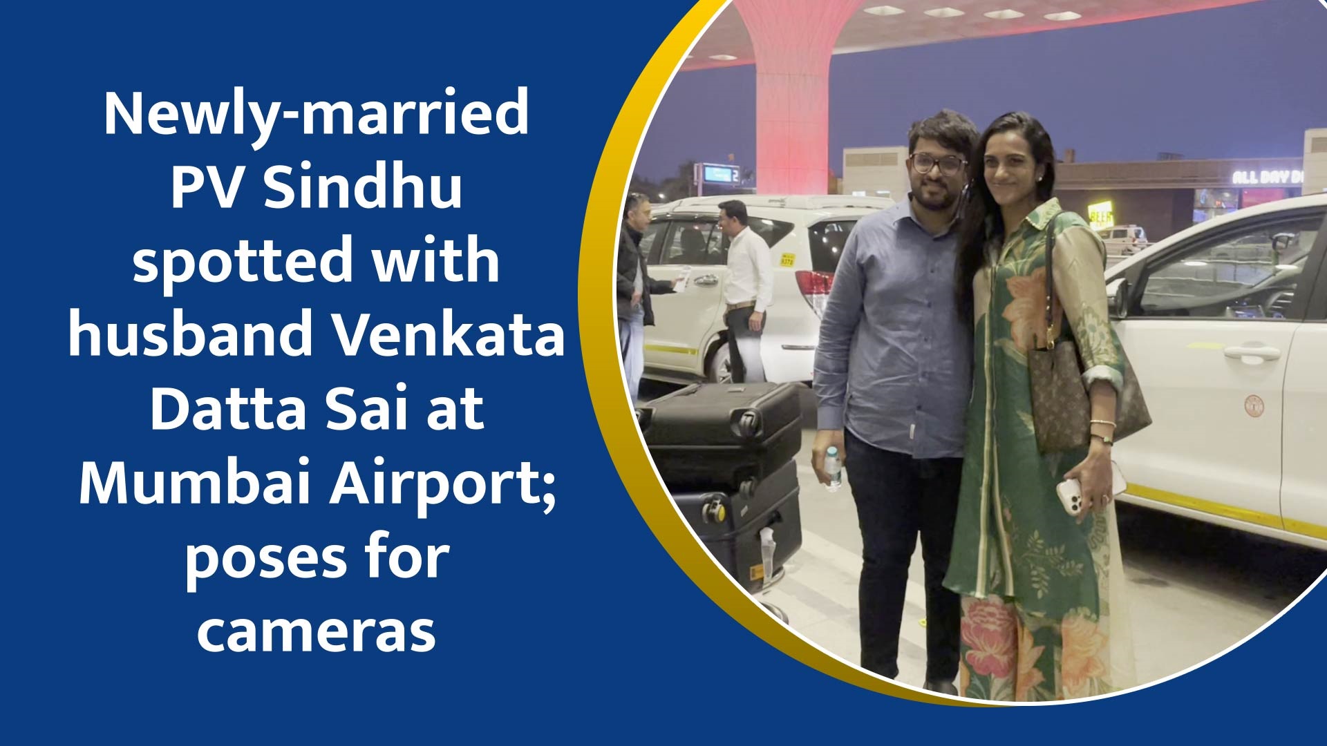 Newly-married PV Sindhu spotted with husband Venkata Datta Sai at Mumbai Airport; poses for cameras