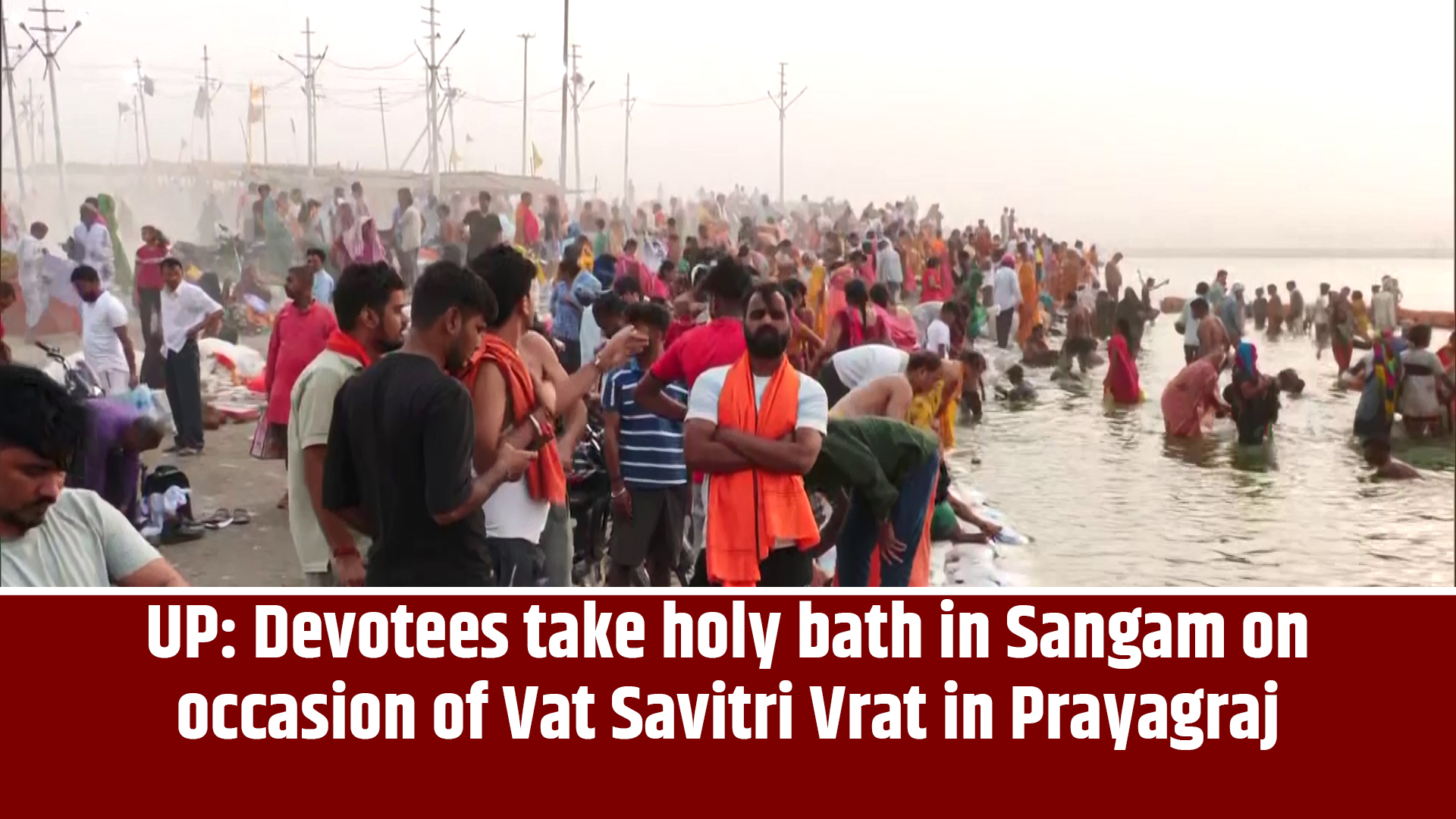 Uttar Pradesh: Devotees take holy bath in Sangam on occasion of Vat Savitri Vrat in Prayagraj