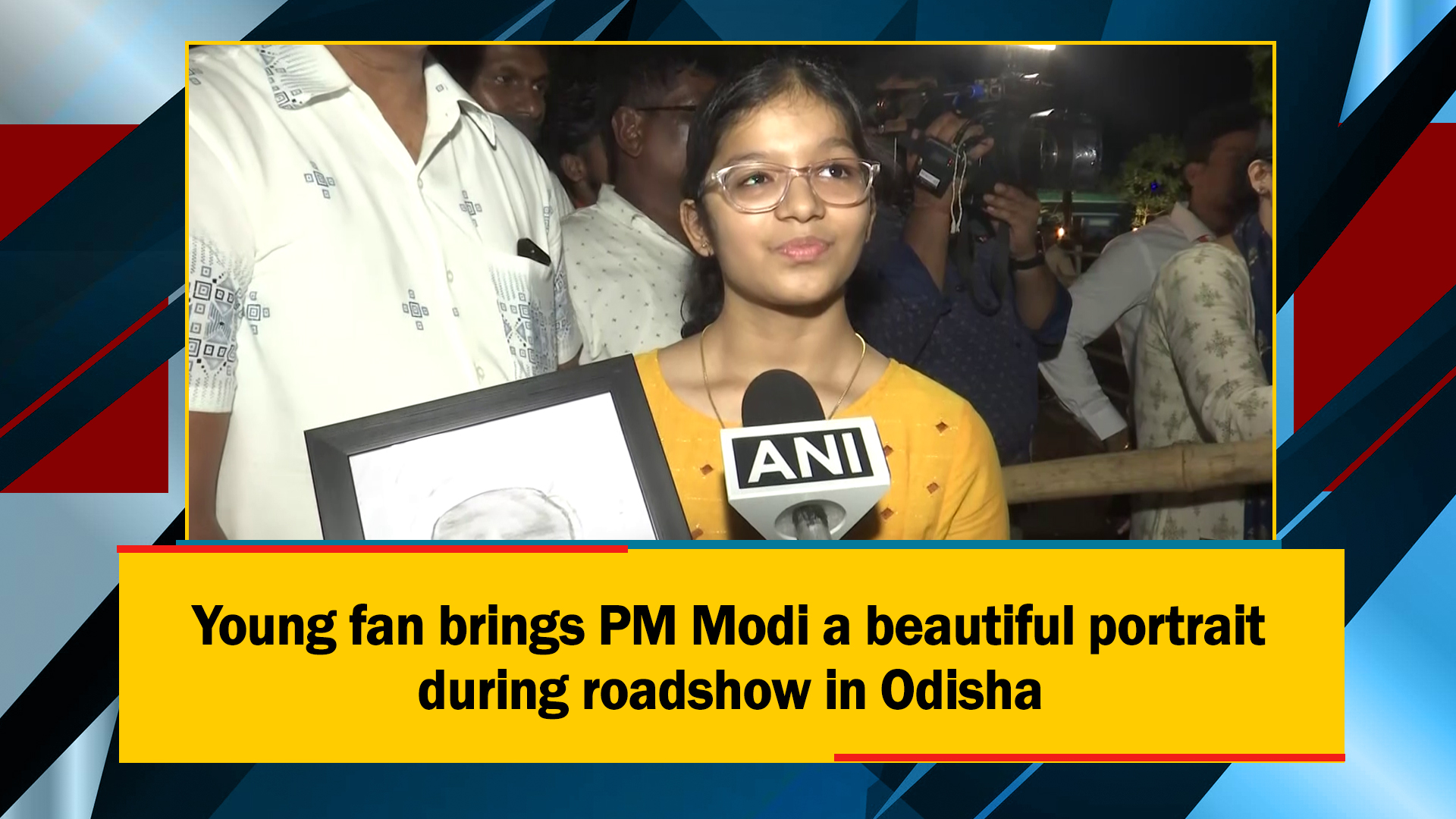 Young fan brings PM Modi a beautiful portrait during roadshow in Odisha